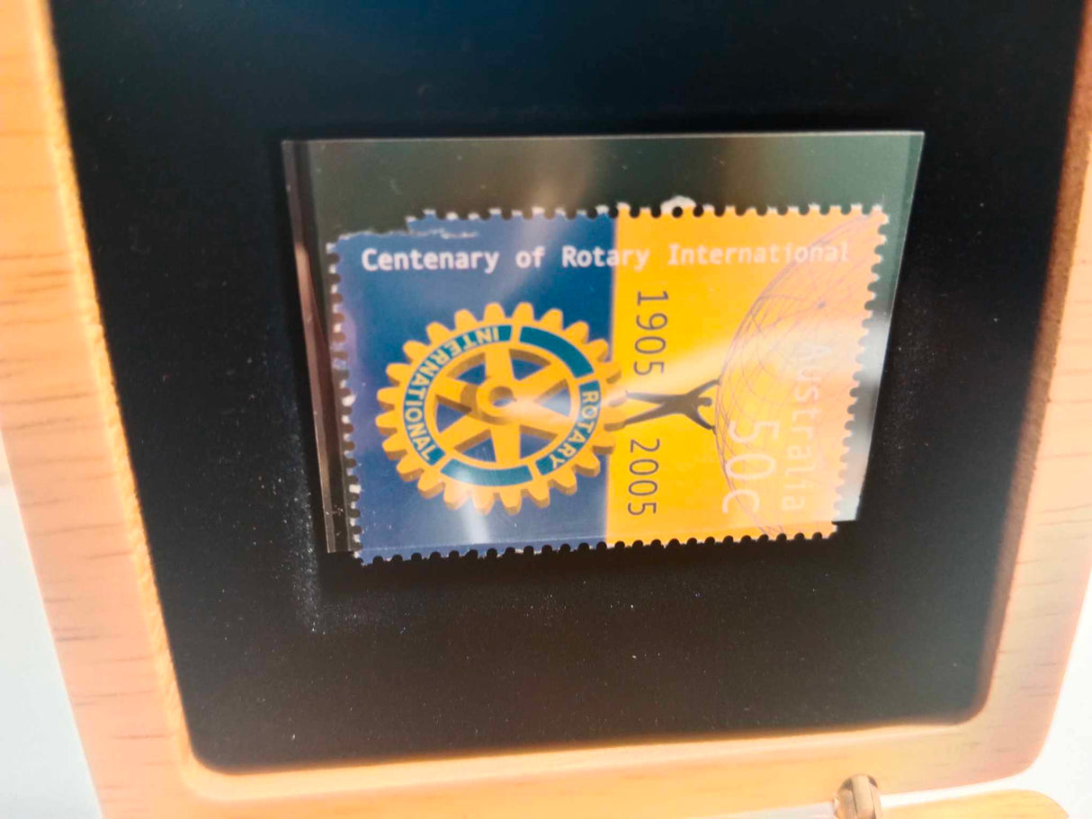 2005 $1 Coin and Stamp Set. A Centenary of Service. 100 Years of Rotary.