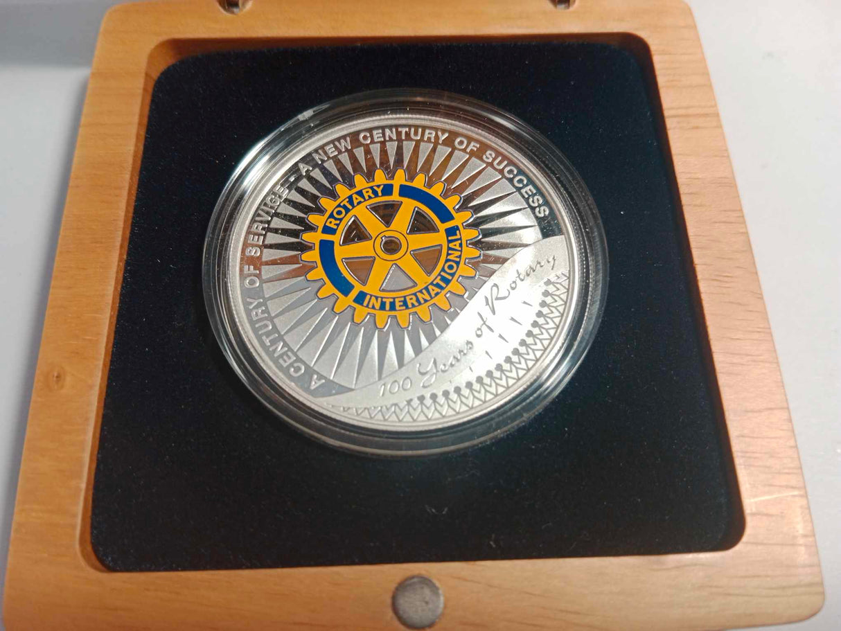 2005 $1 Coin and Stamp Set. A Centenary of Service. 100 Years of Rotary.