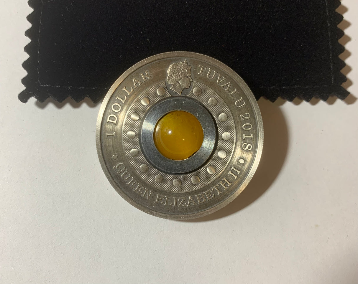 2018 $1 1oz Silver Rotating Antiquated Coin. Good Luck.