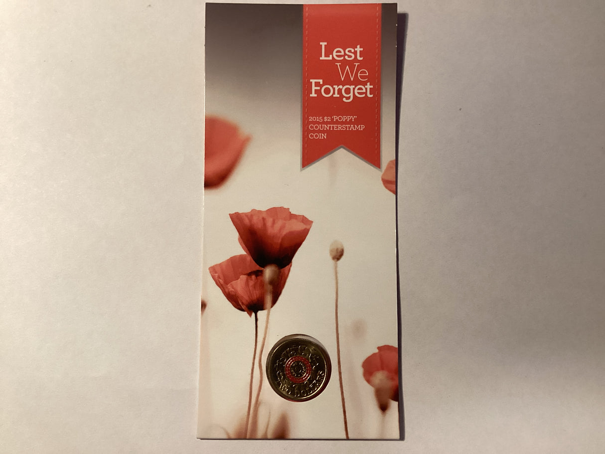 2015 $2 Lest We Forget. Red Anzac Cove. Poppy Counterstamp Carded Coin.