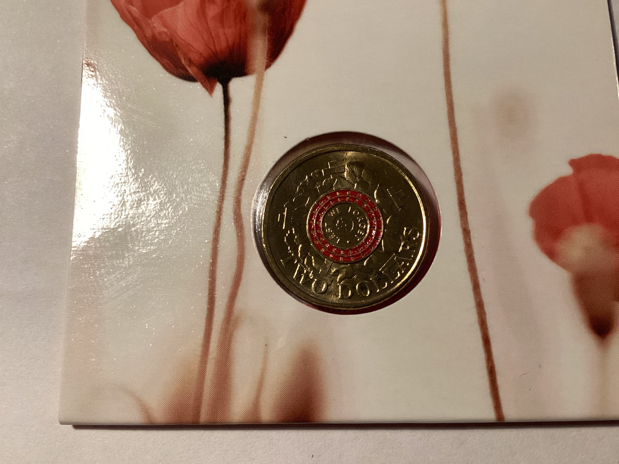 2015 $2 Lest We Forget. Red Anzac Cove. Poppy Counterstamp Carded Coin.
