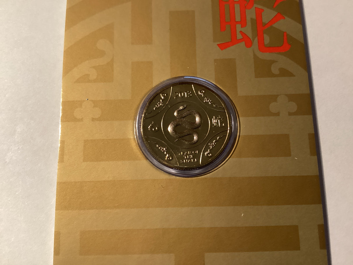 2013 $1 Uncirculated Coin. Lunar Series. Year of the Snake.