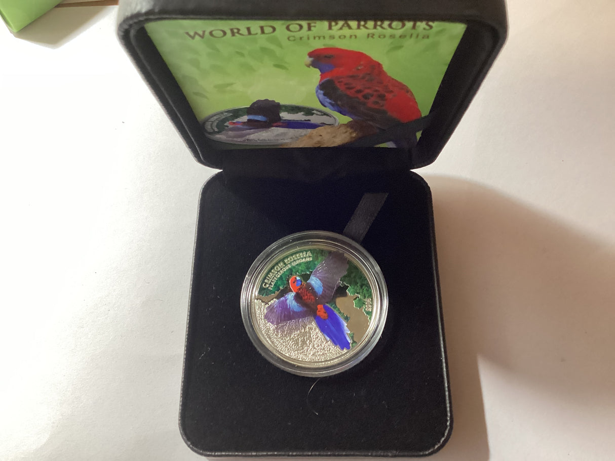 2014 $1 1oz Silver Coloured Proof Coin. World of Parrots. Crimson Rosella.