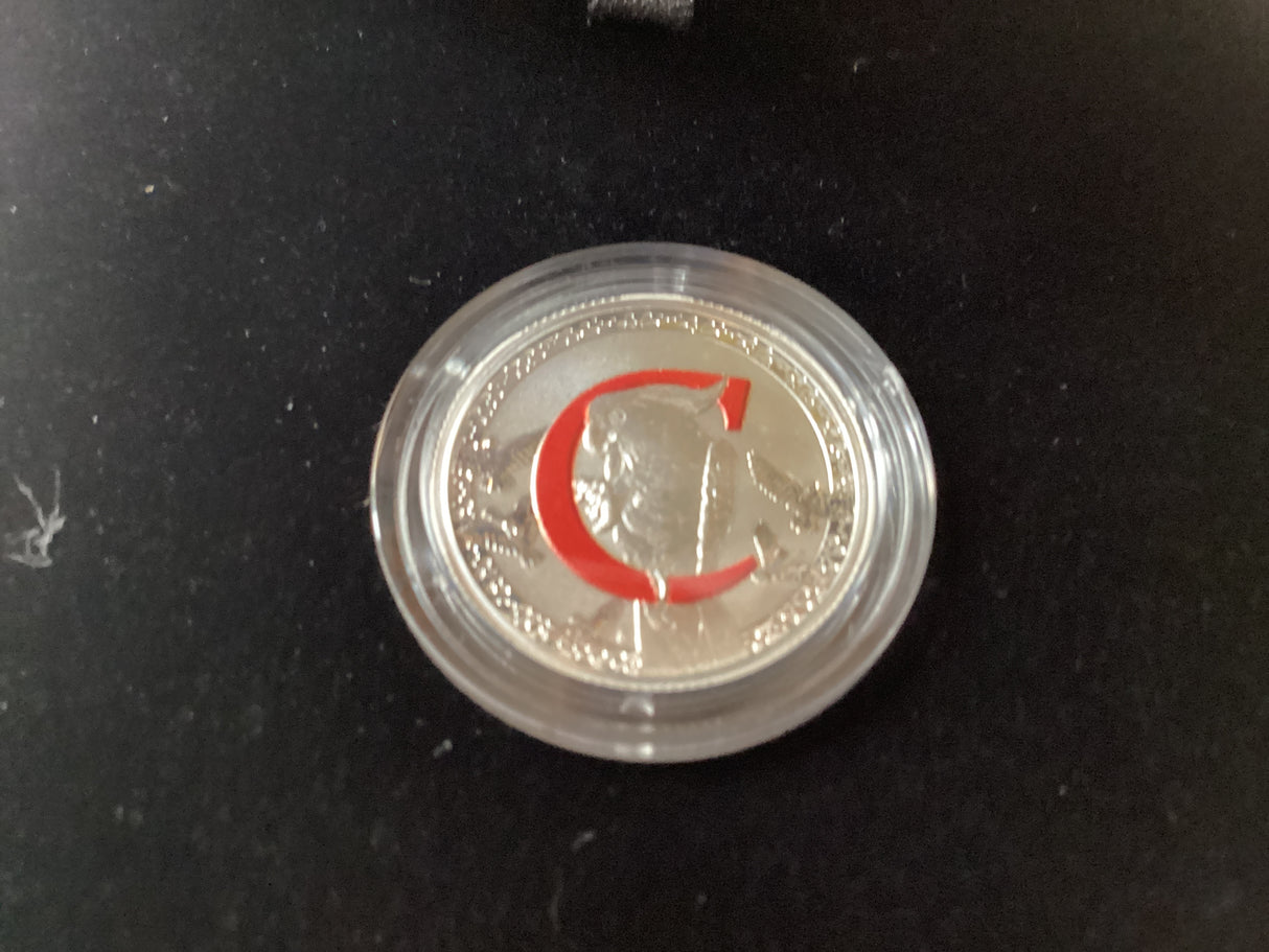 2017 $1 Fine Silver Coloured Proof Coin. Alphabet Series. ‘C’ for Charming.