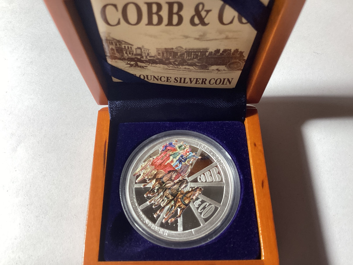 2004 $1 1oz Silver Proof Coloured Coin. Cobb & Co 150 Years.