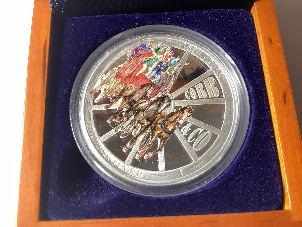 2004 $1 1oz Silver Proof Coloured Coin. Cobb & Co 150 Years.