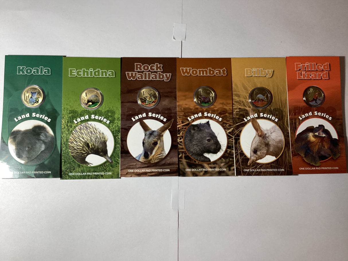 2013 $1 Pad Printed Coloured Coins. Land Series. Complete Set