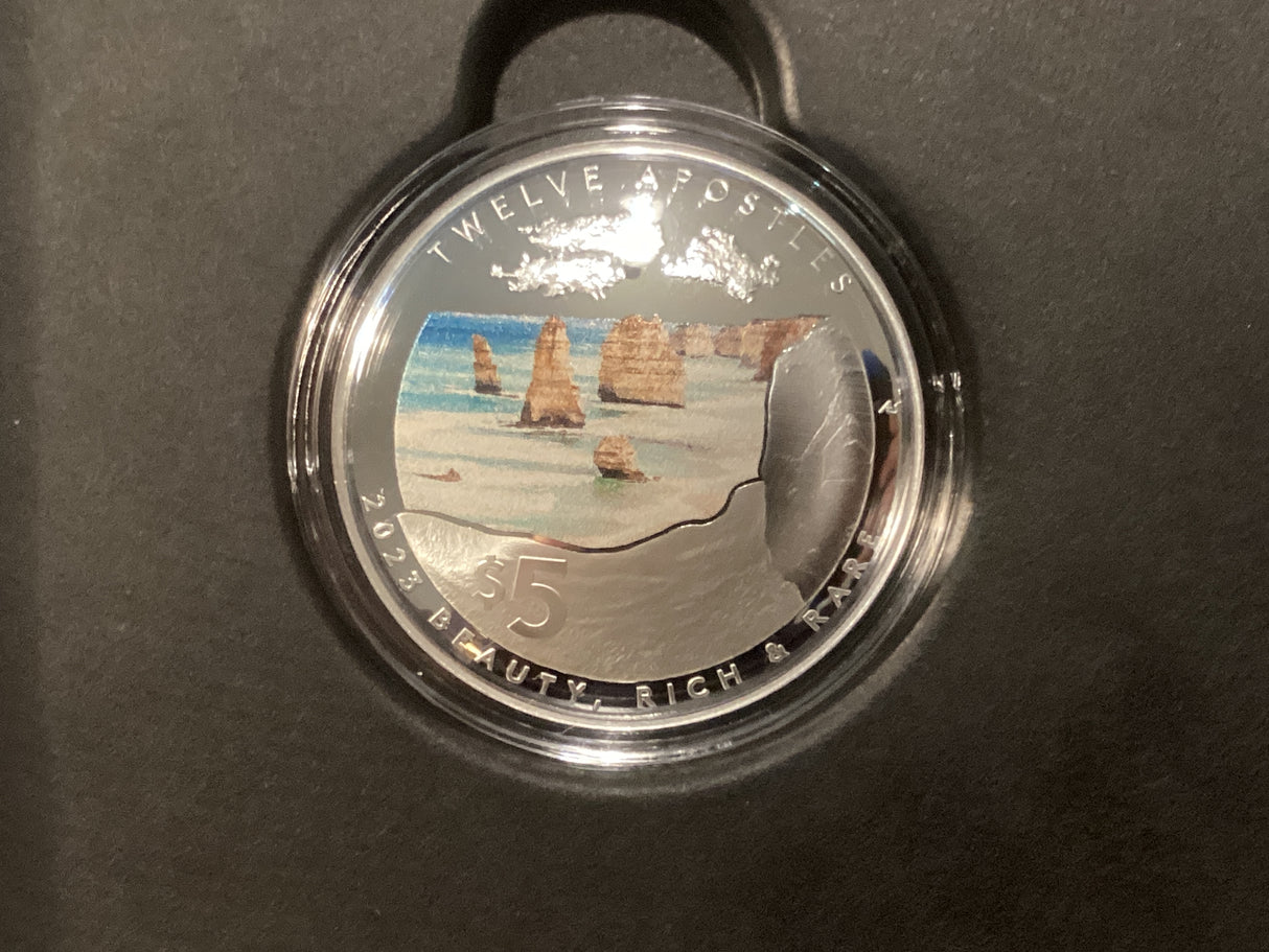 2023 $5 1oz Silver Coloured Proof Domed Coin. Beauty, Rich, Rare. Twelve Apostles.