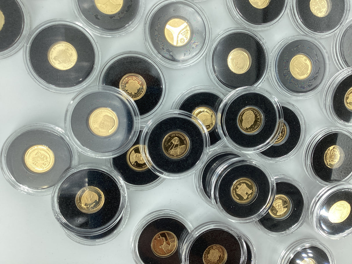 2005- The Smallest Gold Coins of the World. Multiple Countries. 0.5 Grams of Pure Gold in Each Coin.