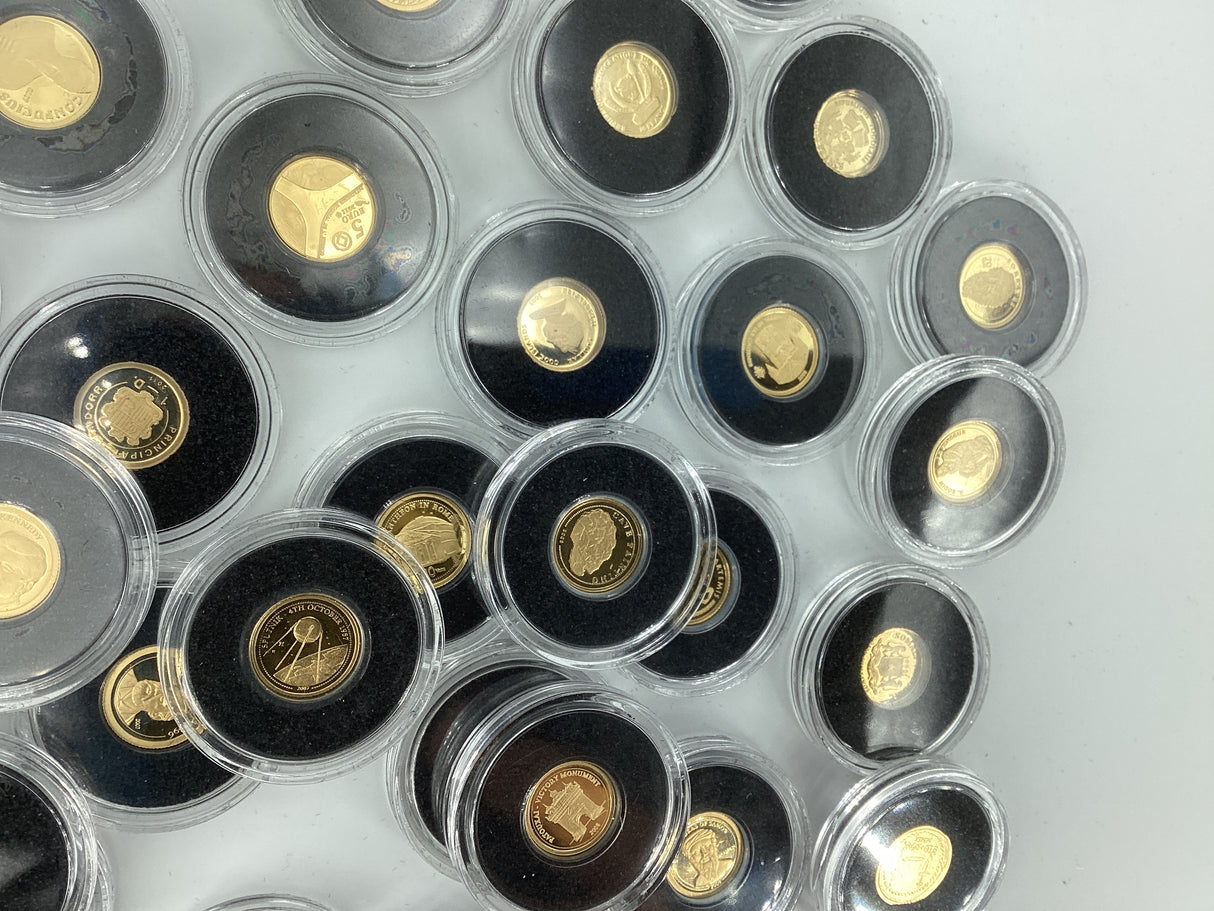 2005- The Smallest Gold Coins of the World. Multiple Countries. 0.5 Grams of Pure Gold in Each Coin.