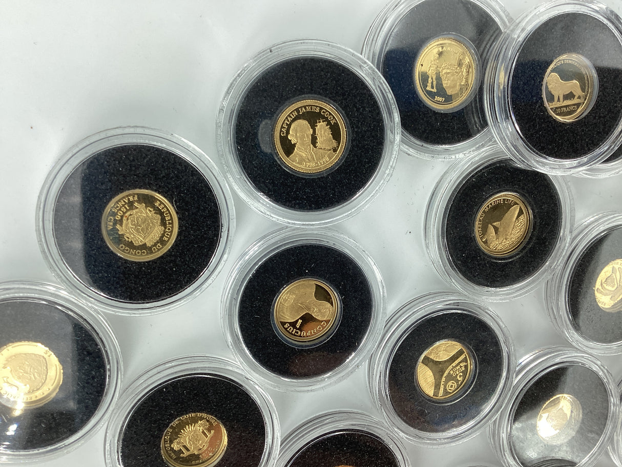 2005- The Smallest Gold Coins of the World. Multiple Countries. 0.5 Grams of Pure Gold in Each Coin.