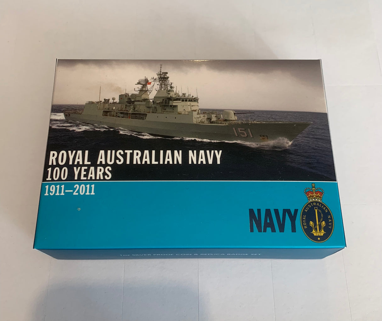 2011 Royal Australian Navy. 100 Years. 1 Ounce Silver Proof Coin and Badge set