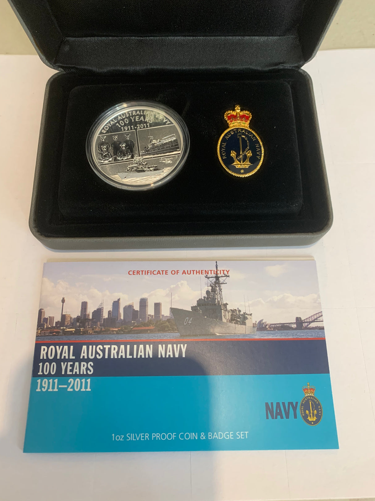 2011 Royal Australian Navy. 100 Years. 1 Ounce Silver Proof Coin and Badge set