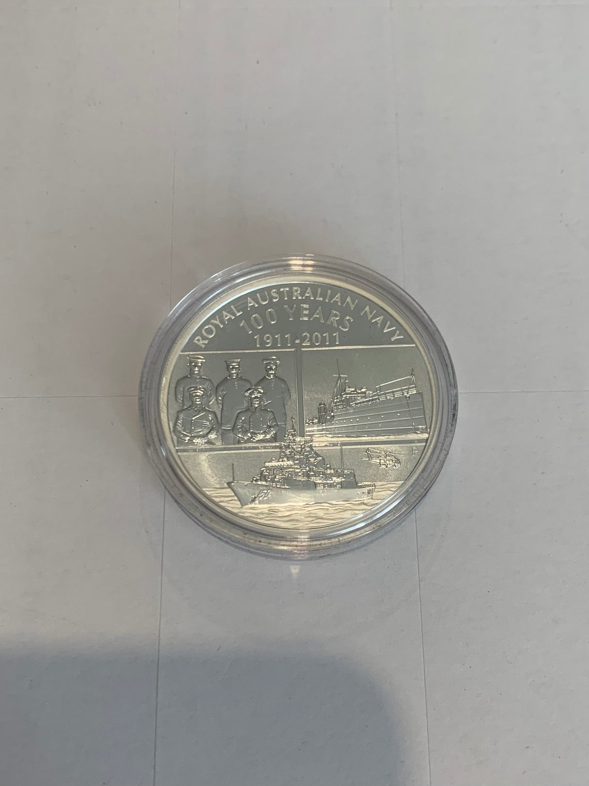 2011 Royal Australian Navy. 100 Years. 1 Ounce Silver Proof Coin and Badge set