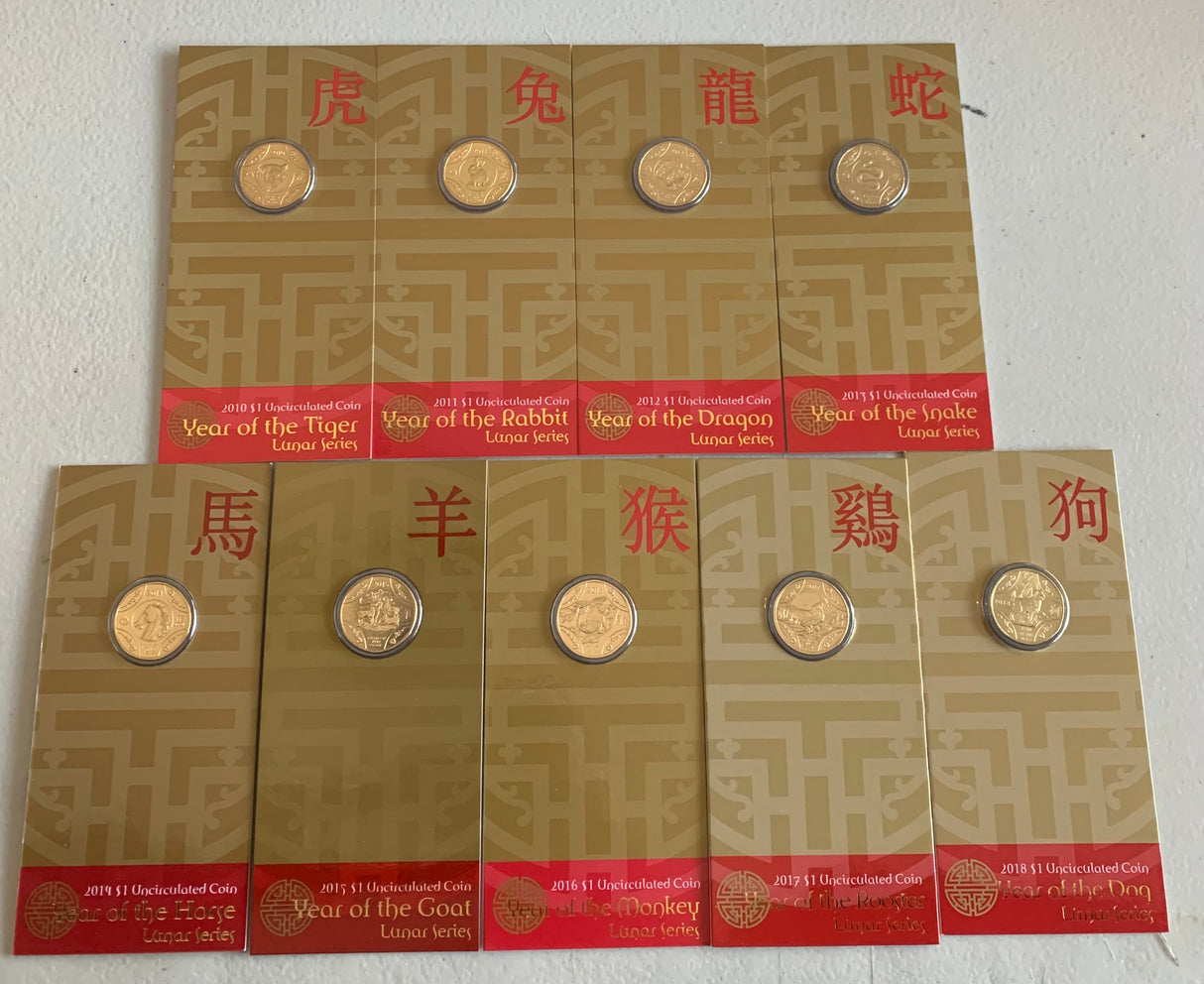 2010-2018 Set Of 9 Lunar $1 Uncirculated Carded Coins.