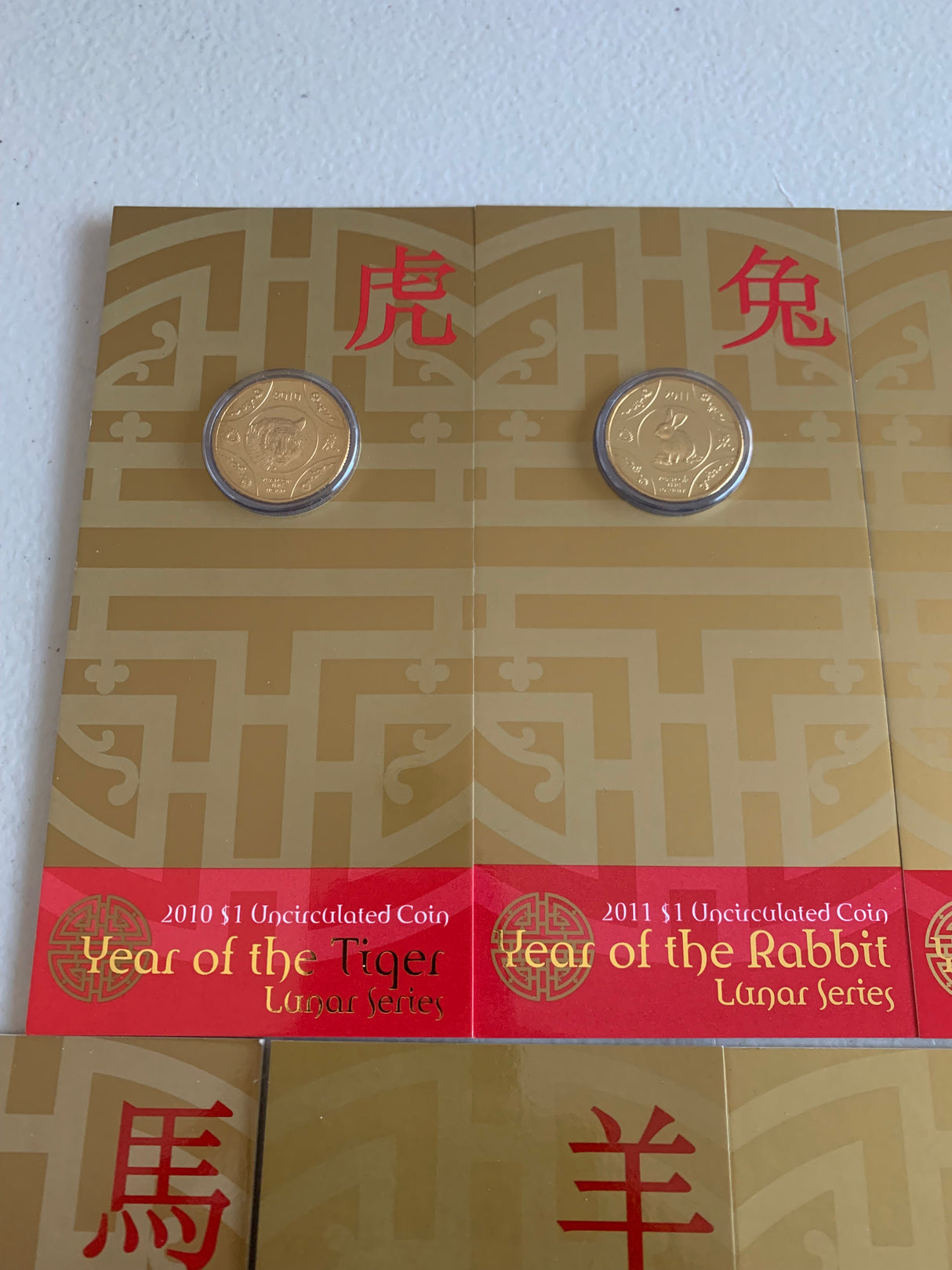 2010-2018 Set Of 9 Lunar $1 Uncirculated Carded Coins.