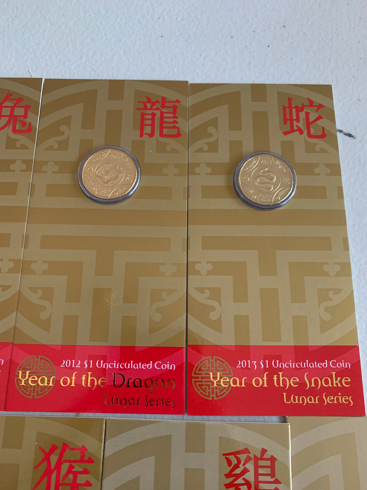 2010-2018 Set Of 9 Lunar $1 Uncirculated Carded Coins.