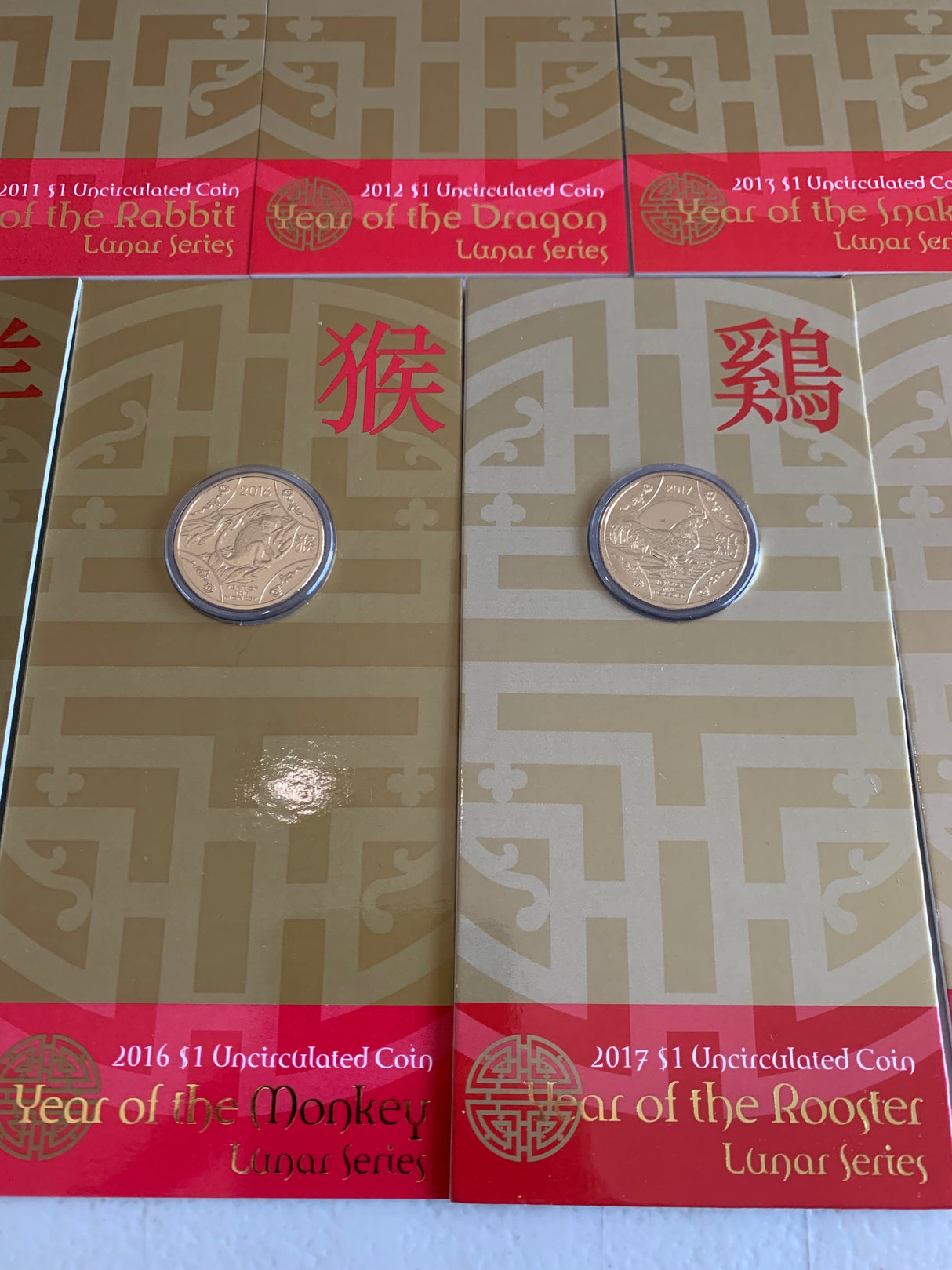 2010-2018 Set Of 9 Lunar $1 Uncirculated Carded Coins.