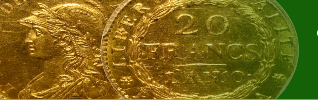 Gold coin with '20 Francs' inscription on a green background