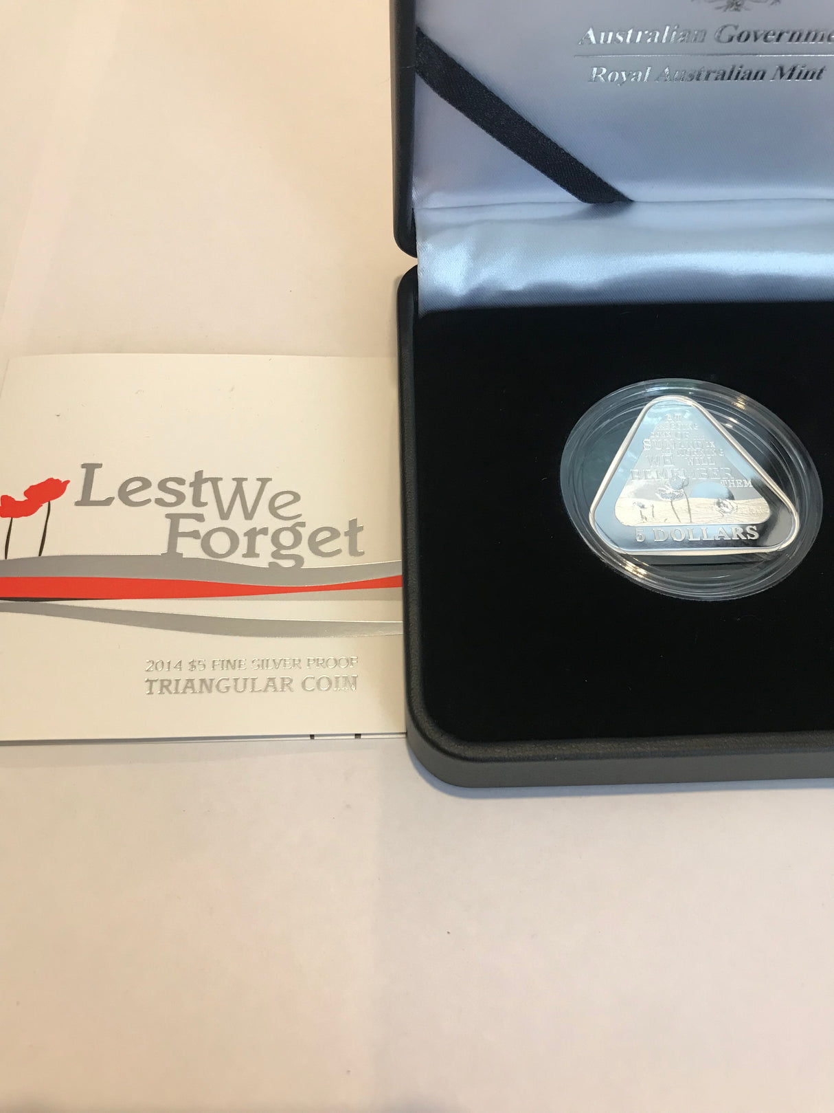 2014 $5 Fine Silver Proof Triangular Coin. Lest We Forget