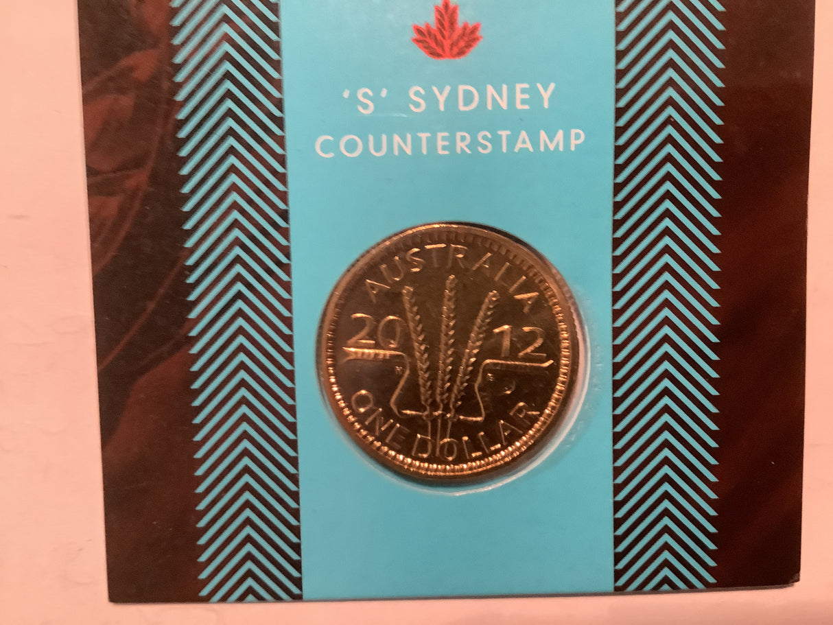 2012 $1 Wheat Sheaf Dollar ’S’ Sydney counter stamp.