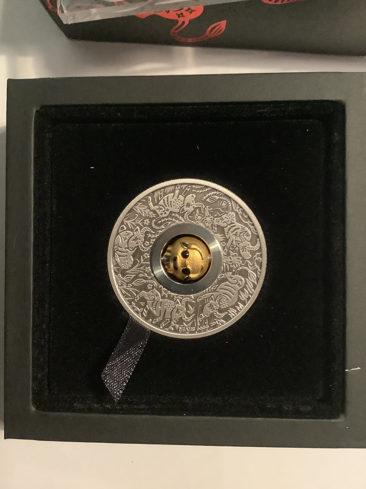 2021 Year of the Ox Rotating Charm. 1oz Silver Antiqued Coin.