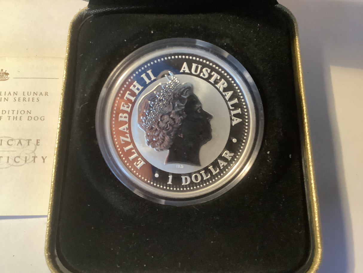 2006 $1 Year of the Dog silver proof coin. Gilded Edition.