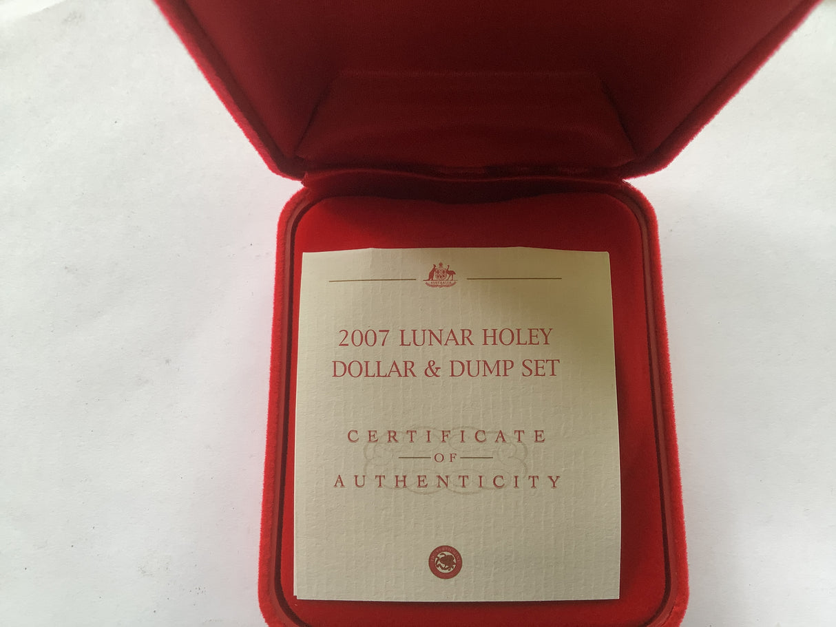 2007 Lunar Holey Dollar and Dump Set. 1 Ounce Silver Proof Coin