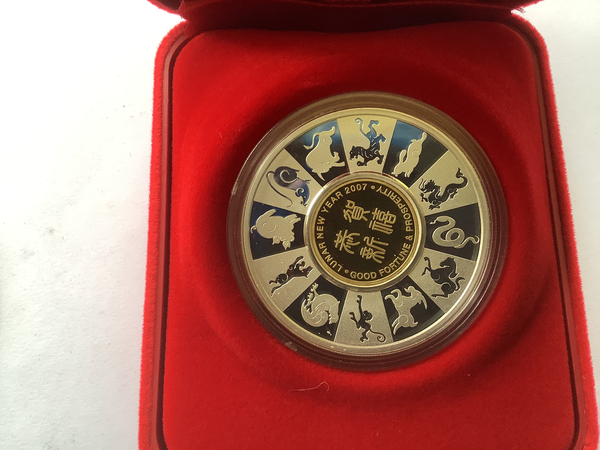 2007 Lunar Holey Dollar and Dump Set. 1 Ounce Silver Proof Coin