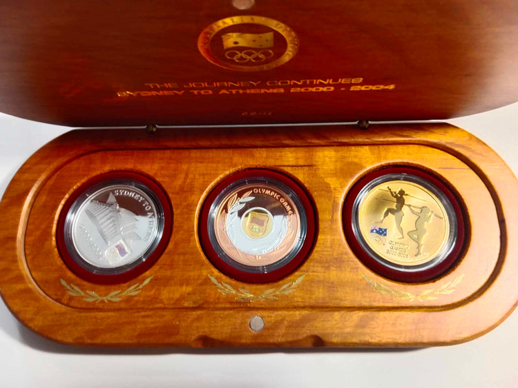 2004 The Journey Counties Sydney to Athens Three-Coin Set. Gold, Silver, Bronze.