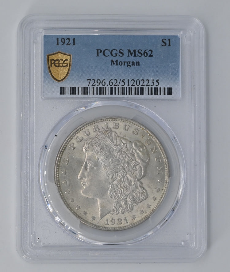 1921 $1 United States. Morgan Dollar. MS62.   A classic 1921 Morgan Dollar, graded MS62, showcasing Liberty’s iconic design. A historic and highly collectible piece.