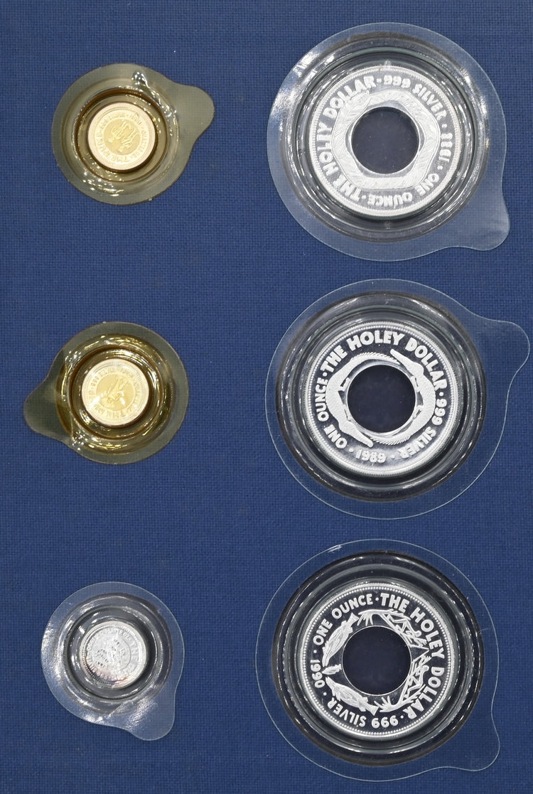 1988-1990 The Holley Dollar and Dump Six Coin Collection and Book.