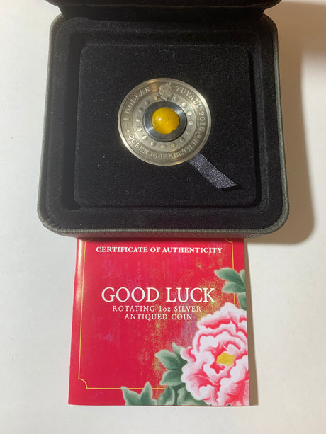 2018 $1 1oz Silver Rotating Antiquated Coin. Good Luck.