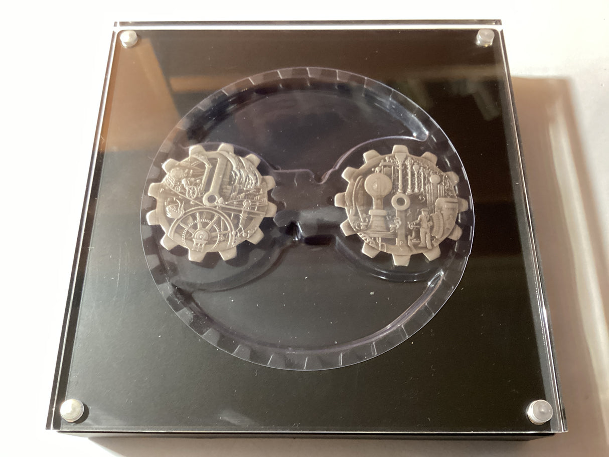 2018 Two-Coin Set. 1oz Gear-Shaped Coins. Evolution of Industry.