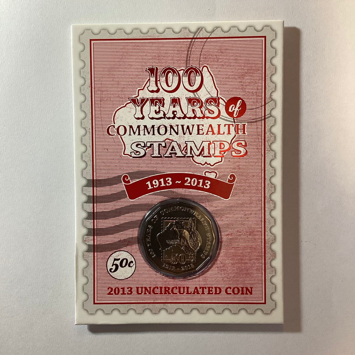 2013 50c 100 Years of Commonwealth Stamps Carded Coin – Ensleigh Coins