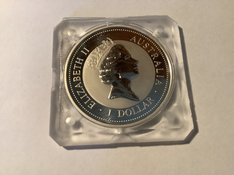 1994 $1 1 ounce silver encapsulated Kookaburra.