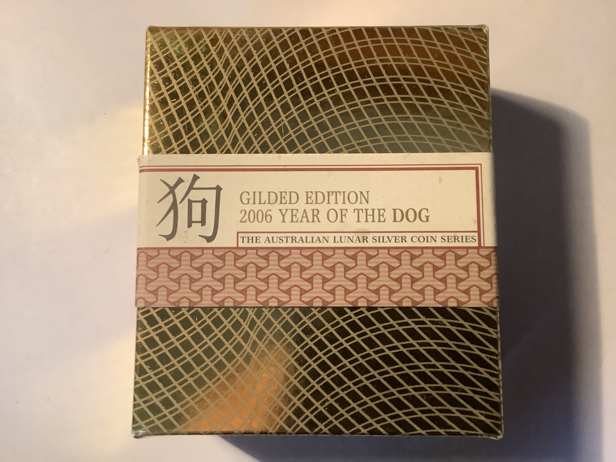 2006 $1 Year of the Dog silver proof coin. Gilded Edition.