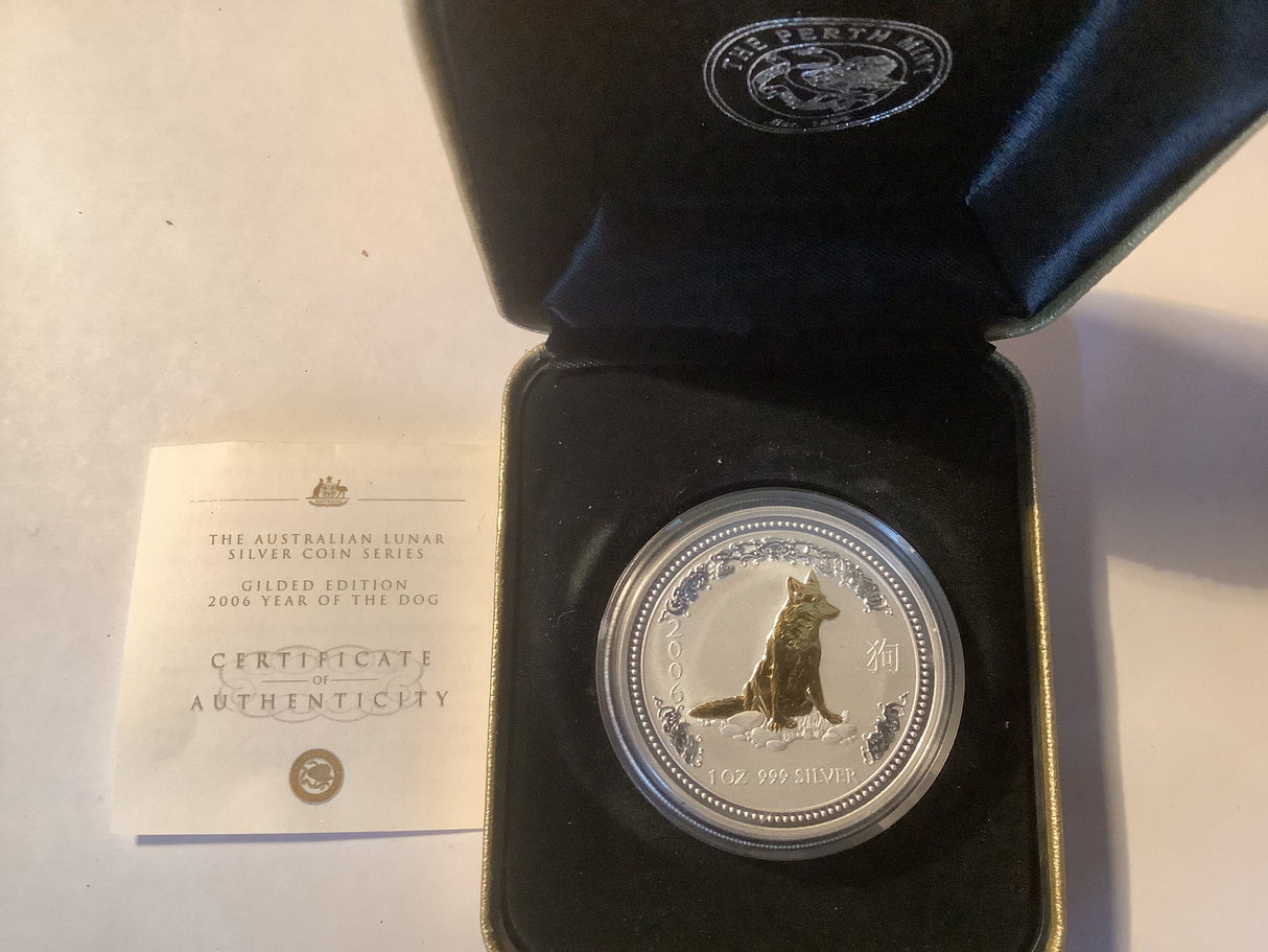 2006 $1 Year of the Dog silver proof coin. Gilded Edition.