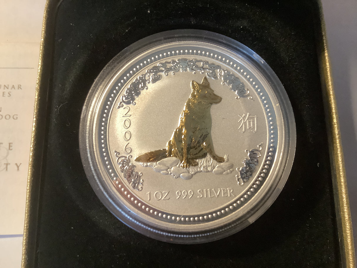 2006 $1 Year of the Dog silver proof coin. Gilded Edition.
