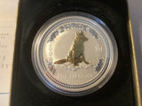 2006 $1 Year of the Dog silver proof coin. Gilded Edition.